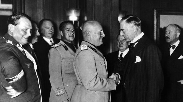 From left to right are: Reichsmarschall and President of the Reichstag Hermann Goering, Italian Foreign Minister Count Ciano and Italian Fascist Leader Benito Mussolini shaking hands with Prime Minister of Great Britain Neville Chamberlain during the Four Power Conference held in autumn 1938 in Munich, Germany. Others not identified - Sputnik International