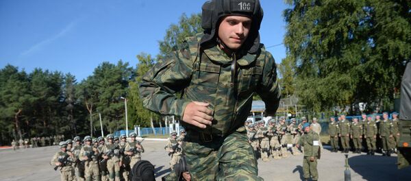 A serviceman of the CSTO's Collective Rapid Deployment Forces hold the Interaction 2015 joint drill in the Pskov Region A serviceman of the CSTO's Collective Rapid Deployment Forces hold the Interaction 2015 joint drill in the Pskov Region - Sputnik International