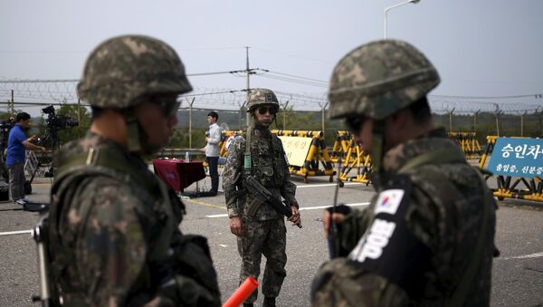 South Korean soldiers stand guard at a checkpoint on the Grand Unification Bridge which leads to the truce village Panmunjom, just south of the demilitarized zone separating the two Koreas, in Paju, South Korea - Sputnik International