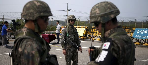 South Korean soldiers stand guard at a checkpoint on the Grand Unification Bridge which leads to the truce village Panmunjom, just south of the demilitarized zone separating the two Koreas, in Paju, South Korea - Sputnik International