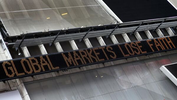 A headline about the global sell-off in stocks is displayed on the Times Square Zipper in New York, August 24, 2015 - Sputnik International