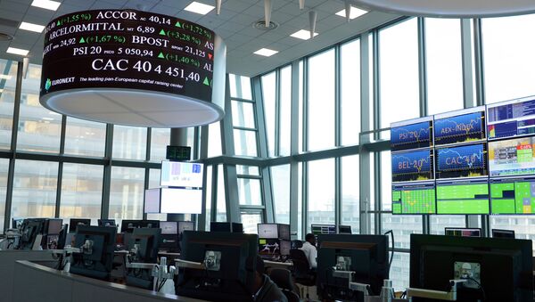 Stock market operator Euronext's unversal analysts work in the market services surveillance room center at the new Euronext headquarters in the La Defense business district, near Paris - Sputnik International