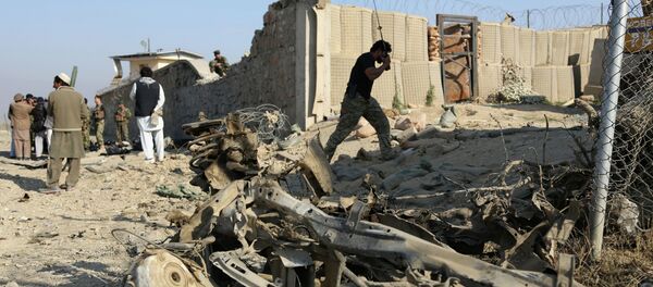 Afghan officials investigate the site of a deadly suicide attack on a joint NATO-Afghan base in the Ghani Khail district of Nangarhar province, east of Jalalabad, Afghanistan. File photo Afghan officials investigate the site of a deadly suicide attack on a joint NATO-Afghan base in the Ghani Khail district of Nangarhar province, east of Jalalabad, Afghanistan. File photo - Sputnik International