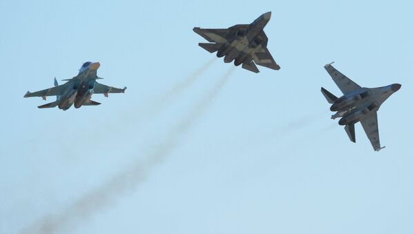 Su-34 (left), T-50 (centre) and Su-35 (right) aircraft at the 2015 MAKS air show's opening ceremony in the Moscow suburban town of Zhukovsky. - Sputnik International