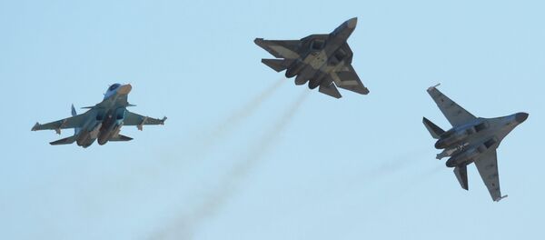 Su-34 (left), T-50 (centre) and Su-35 (right) aircraft at the 2015 MAKS air show's opening ceremony in the Moscow suburban town of Zhukovsky. Su-34 (left), T-50 (centre) and Su-35 (right) aircraft at the 2015 MAKS air show's opening ceremony in the Moscow suburban town of Zhukovsky. - Sputnik International