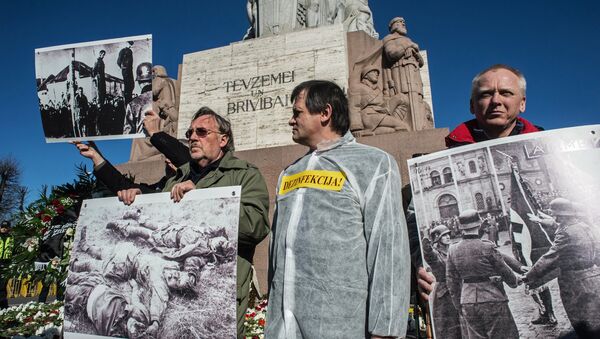 Antifascists hold an action protesting public events held on the occasion of the day of memory of the Latvian Legion Waffen-SS at the Freedom Monument in Riga - Sputnik International