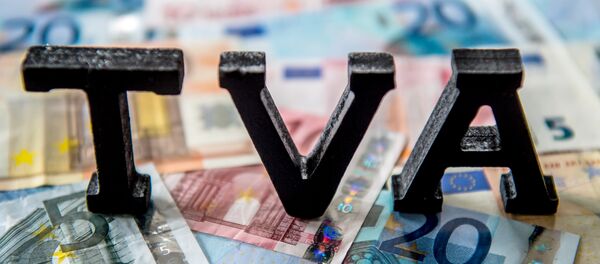 The word TVA (VAT, value-added tax) is seen on top of euro banknotes in Lille on August 25, 2014 - Sputnik International