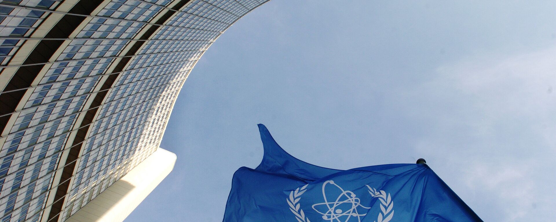 IAEA flag flatters in the wind in front of the International Atomic Energy Agency headquarers in Vienna. File photo  - Sputnik International, 1920, 05.08.2022