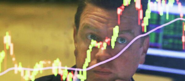 Specialist Michael O'Mara works on the floor of the New York Stock Exchange, Tuesday, Aug. 25, 2015` - Sputnik International