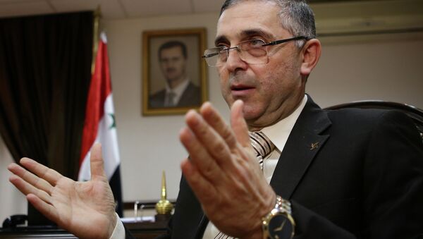 Syrian Minister of State for National Reconciliation Affairs Ali Haidar gives an interview with AFP in Damascus on November 10, 2014. - Sputnik International