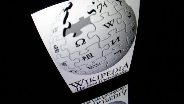 The Wikipedia logo is seen on a tablet screen on December 4, 2012 in Paris - Sputnik International