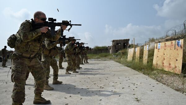 August 14, 2015, US army soldiers fire during a military exercise inside coalition force Forward Operating Base (FOB) Connelly in the Khogyani district in the eastern province of Nangarhar - Sputnik International