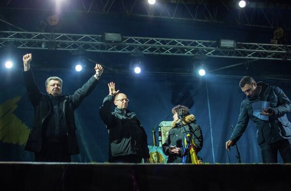 From left: Petro Poroshenko, a Ukrainian businessman and Roshen group owner, Arseniy Yatsenyuk, All-Ukrainian Union Fatherland leader; Vitali Klitschko, leader of the Ukrainian Democratic Alliance for Reform of Vitali Klitschko, during a rally in Independece Square, February 2014 From left: Petro Poroshenko, a Ukrainian businessman and Roshen group owner, Arseniy Yatsenyuk, All-Ukrainian Union Fatherland leader; Vitali Klitschko, leader of the Ukrainian Democratic Alliance for Reform of Vitali Klitschko, during a rally in Independece Square, February 2014 - Sputnik International