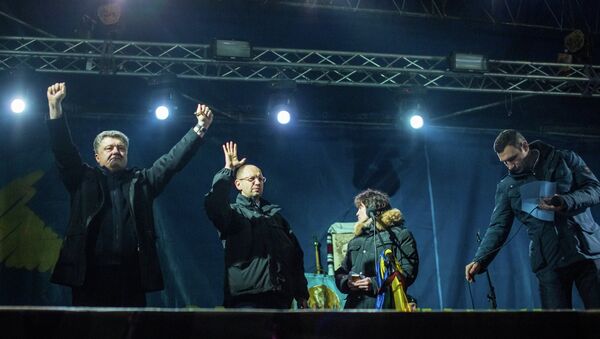 From left to right: Petro Poroshenko, Arseniy Yatsenyuk and Vitali Klitschko  during a rally at the Kiev's Independece Square. File photo. - Sputnik International