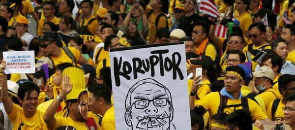 Protesters march at a rally organised by pro-democracy group Bersih (Clean) in Malaysia's capital city of Kuala Lumpur, August 29, 2015 Protesters march at a rally organised by pro-democracy group Bersih (Clean) in Malaysia's capital city of Kuala Lumpur, August 29, 2015 - Sputnik International