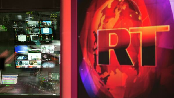 Control room of the Russia Today English-language newsroom - Sputnik International