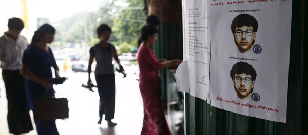 People line up as they leave their slippers near a wanted poster for the main suspect of a deadly bomb blast in Bangkok, Thailand, put up by local authorities at Shwedagon pagoda in Yangon, Myanmar August 25, 2015 People line up as they leave their slippers near a wanted poster for the main suspect of a deadly bomb blast in Bangkok, Thailand, put up by local authorities at Shwedagon pagoda in Yangon, Myanmar August 25, 2015 - Sputnik International