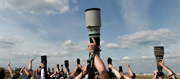 Photo correspondents at the MAKS 2015 International Aviation and Space Salon in Zhukovsky outside Moscow. Photo correspondents at the MAKS 2015 International Aviation and Space Salon in Zhukovsky outside Moscow. - Sputnik International