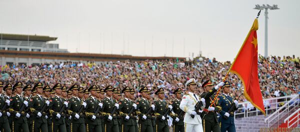 Soldiers of China's People's Liberation Army (PLA) march during a rehearsal for a military parade in Beijing - Sputnik International
