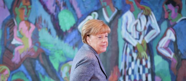German chancellor Angela Merkel arrives for a cabinet meeting at the chancellery in Berlin, Aug. 26, 2015. - Sputnik International