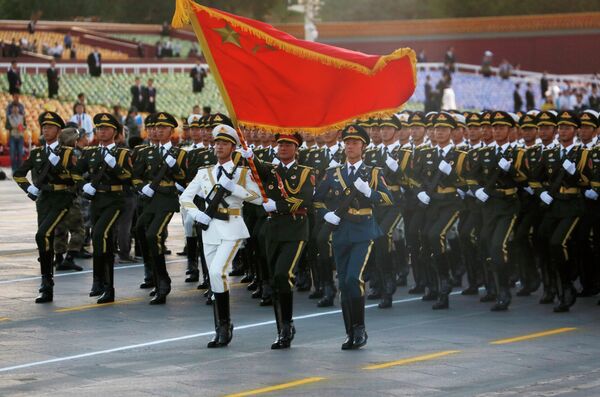 Chinese military personnel march into position ahead of a military parade commemorating the 70th anniversary of Japan's surrender during World War II. Chinese military personnel march into position ahead of a military parade commemorating the 70th anniversary of Japan's surrender during World War II. - Sputnik International