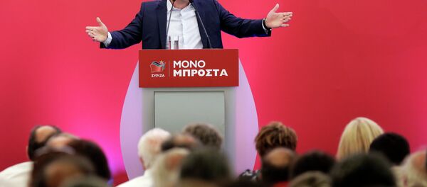 Outgoing Greek Prime Minister and the Syriza party leader Alexis Tsipras speaks to a gathering of his party members in Athens, on Saturday, Aug. 29, 2015. - Sputnik International