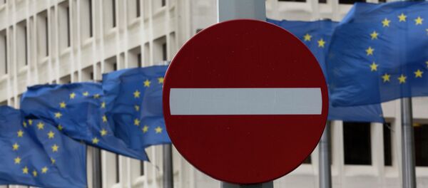 In this photo taken on Monday, March 30, 2015 EU flags flap in the wind behind a no entry traffic sign in front of EU headquarters in Brussels In this photo taken on Monday, March 30, 2015 EU flags flap in the wind behind a no entry traffic sign in front of EU headquarters in Brussels - Sputnik International