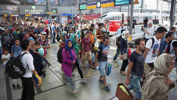 Migrants arrive to the main railway station in Munich, Germany, September 1, 2015 - Sputnik International