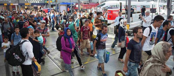 Migrants arrive to the main railway station in Munich, Germany, September 1, 2015 - Sputnik International