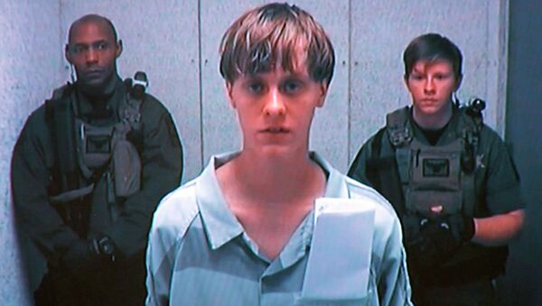Dylann Storm Roof appears by closed-circuit television at his bond hearing in Charleston, South Carolina in this file photo taken from video June 19, 2015 - Sputnik International