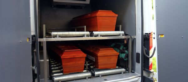 The coffins of mother Rehan Kurdi, and Syrian boys Aylan, 3, and Galip, 5, who were washed up drowned on a beach near Turkish resort of Bodrum on Wednesday, are placed in a funeral car in Mugla, Turkey, Thursday, Sept. 3, 2015 The coffins of mother Rehan Kurdi, and Syrian boys Aylan, 3, and Galip, 5, who were washed up drowned on a beach near Turkish resort of Bodrum on Wednesday, are placed in a funeral car in Mugla, Turkey, Thursday, Sept. 3, 2015 - Sputnik International