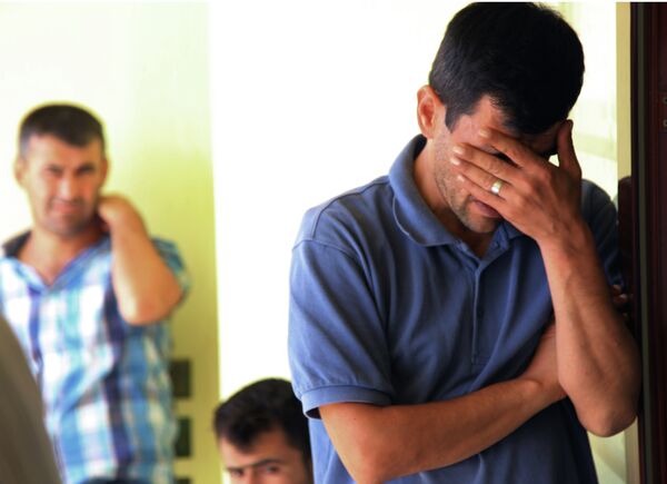 Abdullah Kurdi, 40, father of Syrian boys Aylan, 3, and Galip, 5, who were washed up drowned on a beach near Turkish resort of Bodrum on Wednesday, cries as he waits for the delivery of their bodies outside a morgue in Mugla, Turkey, Thursday, Sept. 3, 2015 Abdullah Kurdi, 40, father of Syrian boys Aylan, 3, and Galip, 5, who were washed up drowned on a beach near Turkish resort of Bodrum on Wednesday, cries as he waits for the delivery of their bodies outside a morgue in Mugla, Turkey, Thursday, Sept. 3, 2015 - Sputnik International