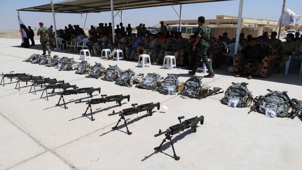 New US-made weapons, that will be given to the Sunni tribal volunteers to fight Islamic State group militants to regain Ramadi, in Habaniyah army base, 80 kilometers (50 miles) west of Baghdad, Iraq, Thursday, Sept. 3, 2015 - Sputnik International