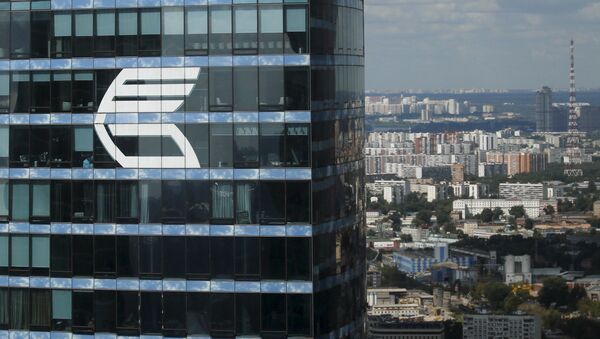 The logo of VTB Group is seen through a window of Imperia Tower on the facade of the Federatsiya (Federation) Tower at the Moscow International Business Center also known as Moskva-City, in Moscow, Russia, in this August 5, 2015 file photo - Sputnik International