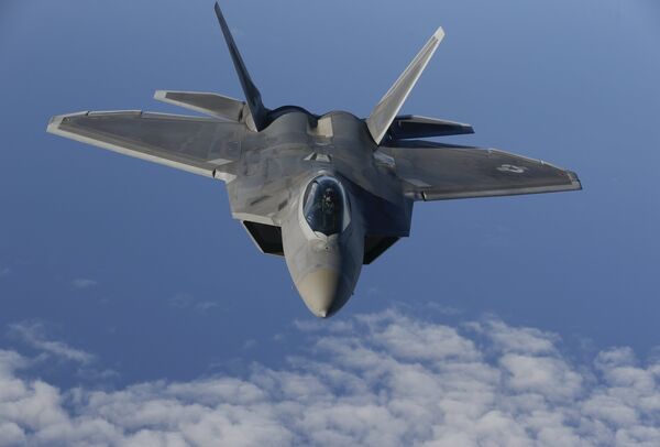 A F-22 Raptor fighter jet of the 95th Fighter Squadron from Tyndall, Florida approaches a KC-135 Stratotanker from the 100th Air Refueling Wing at the Royal Air Force Base in Mildenhall in Britain as they fly over the Baltic Sea towards the newly established NATO airbase of Aemari, Estonia September 4, 2015. A F-22 Raptor fighter jet of the 95th Fighter Squadron from Tyndall, Florida approaches a KC-135 Stratotanker from the 100th Air Refueling Wing at the Royal Air Force Base in Mildenhall in Britain as they fly over the Baltic Sea towards the newly established NATO airbase of Aemari, Estonia September 4, 2015. - Sputnik International