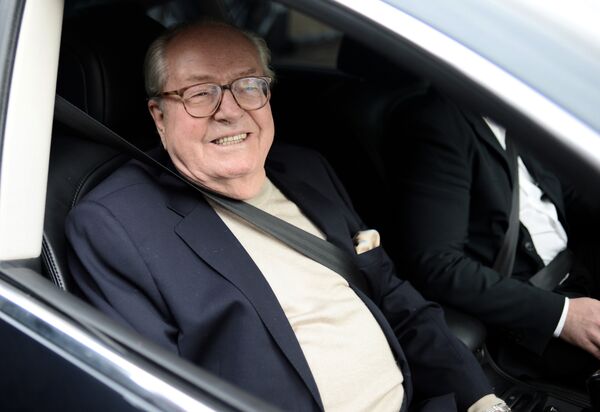 France's far-right party Front National (FN) honorary president Jean-Marie Le Pen smiles as he leaves the party's headquarters in Nanterre, near Paris France's far-right party Front National (FN) honorary president Jean-Marie Le Pen smiles as he leaves the party's headquarters in Nanterre, near Paris - Sputnik International