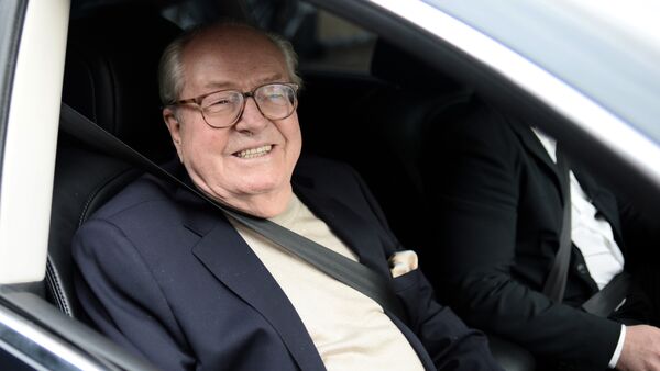 France's far-right party Front National (FN) honorary president Jean-Marie Le Pen smiles as he leaves the party's headquarters in Nanterre, near Paris - Sputnik International