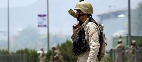 Afghan security forces gather at the site of an attack by Taliban fighters outside the parliament in Kabul, Afghanistan, Monday, June 22, 2015 Afghan security forces gather at the site of an attack by Taliban fighters outside the parliament in Kabul, Afghanistan, Monday, June 22, 2015 - Sputnik International