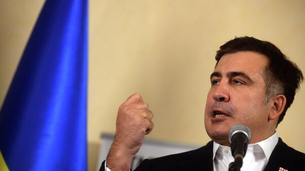 Former Georgian President Mikheil Saakashvili gestures as gives a press conference at the headquarters of the opposition in Kiev on December 7, 2013 - Sputnik International