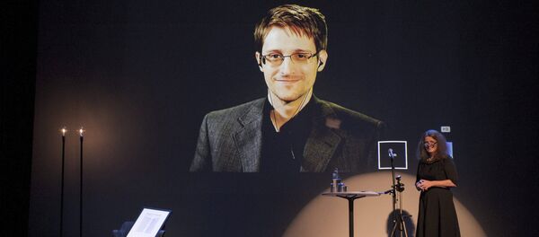 A chair is pictured on stage as former US National Security Agency contractor Edward Snowden. - Sputnik International