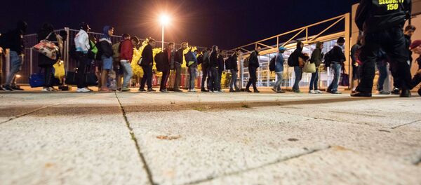 Refugees transported by busses from Munich - Sputnik International