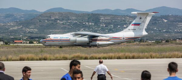 Russian EMERCOM plane with humanitarian aid for the people of Syria arrives to Latakia Airport in Syria. - Sputnik International