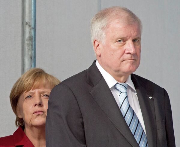 Horst Seehofer, the leader of the right wing Bavarian Christian Social Union said that no society could cope with such prolonged increases in migrants influxes, saying Merkel had sent completely the wrong signal to the world. Horst Seehofer, the leader of the right wing Bavarian Christian Social Union said that no society could cope with such prolonged increases in migrants influxes, saying Merkel had sent completely the wrong signal to the world. - Sputnik International