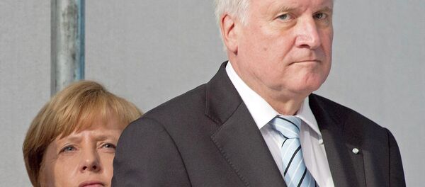 Horst Seehofer, the leader of the right wing Bavarian Christian Social Union said that no society could cope with such prolonged increases in migrants influxes, saying Merkel had sent completely the wrong signal to the world. - Sputnik International