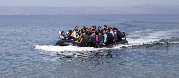 Afghan refugees arrive on a dinghy on the Greek island of Lesbos, September 9, 2015. Afghan refugees arrive on a dinghy on the Greek island of Lesbos, September 9, 2015. - Sputnik International