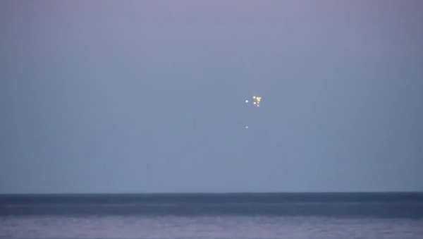 UFOs Enter The Baltic Sea Caught On Video! September 2014 - Sputnik International