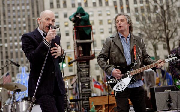 Michael Stipe, left, Peter Buck, right, and R.E.M. perform on NBC's Today in New York's Rockefeller Plaza. Michael Stipe, left, Peter Buck, right, and R.E.M. perform on NBC's Today in New York's Rockefeller Plaza. - Sputnik International