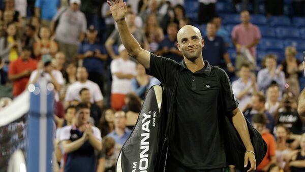 James Blake waves to fans as he leaves the court after being defeated by Ivo Karlovic, of Croatia, in a first round match at the U.S. Open tennis tournament Thursday, Aug. 29, 2013, in New York. - Sputnik International