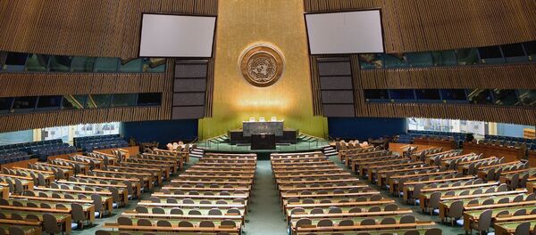 The new non-binding UN resolution sets nine principles for restructuring national debts. Above: UN General Assembly Hall. The new non-binding UN resolution sets nine principles for restructuring national debts. Above: UN General Assembly Hall. - Sputnik International