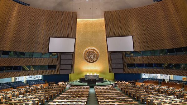The new non-binding UN resolution sets nine principles for restructuring national debts. Above: UN General Assembly Hall. - Sputnik International
